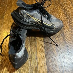 Nike Black and‎ Gold Athletic Shoes